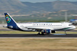 Panning shot of an Olympic Airbus A320 moments after touch down in Athens airport