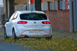 Speeding Seat Leon Ecomotive over some leaves on the road