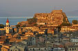 Setting sun light on the old castle of Corfu town
